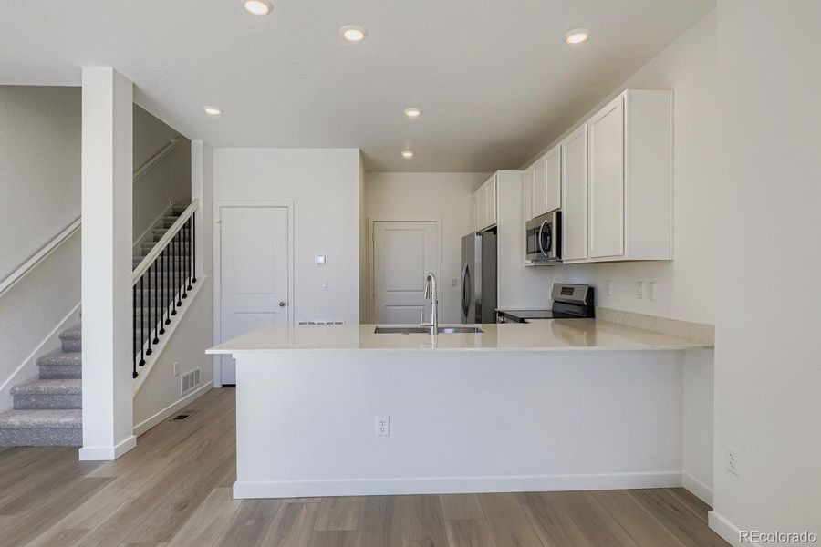Furnished interior view inside a new home in Parterre: The Parkside Collection, Thornton (Image 3).