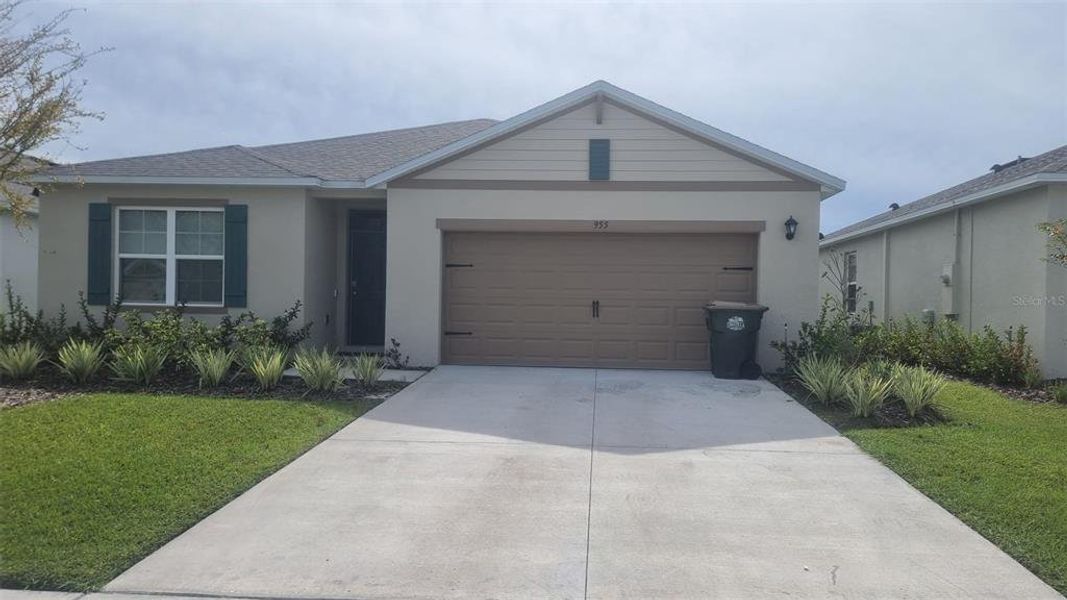 Front exterior of a new home in , Umatilla, FL, highlighting curb appeal (Image 3).