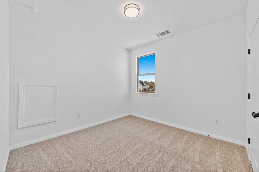 Spacious, unfurnished interior of a new home in Parmer Ranch 60, Georgetown (Image 17).