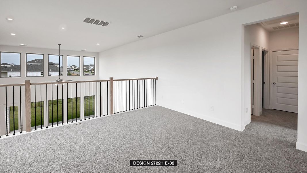 Unfurnished room with carpet flooring, recessed lighting, and a smoke detector