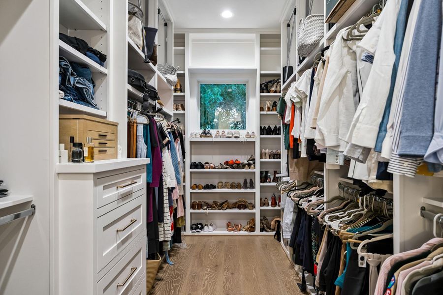 The primary suite offers two generous closets.
