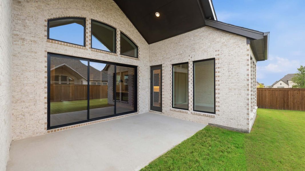 Exterior details and patio area of a home in Terraces, Rockwall (Image 3).