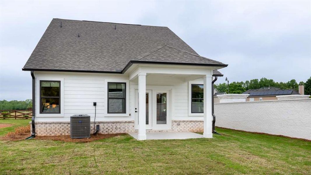 Exterior details and patio area of a home in The Village at Sandy Plains, Marietta (Image 3).