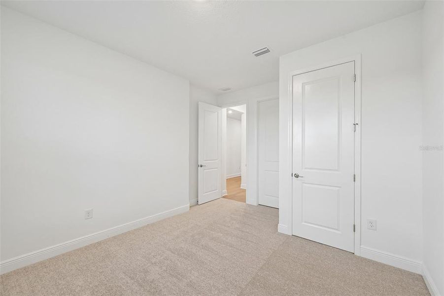 Spacious, unfurnished interior of a new home in Creeks Edge at Twin Rivers, Parrish (Image 26).