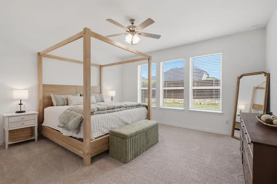Private primary suite with room for a king bed, stylish furniture, and a true retreat feel. The perfect place to unwind at the end of the day.