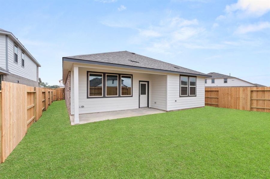 This backyard is perfect for family gatherings, social events, or simply unwinding in the fresh air.