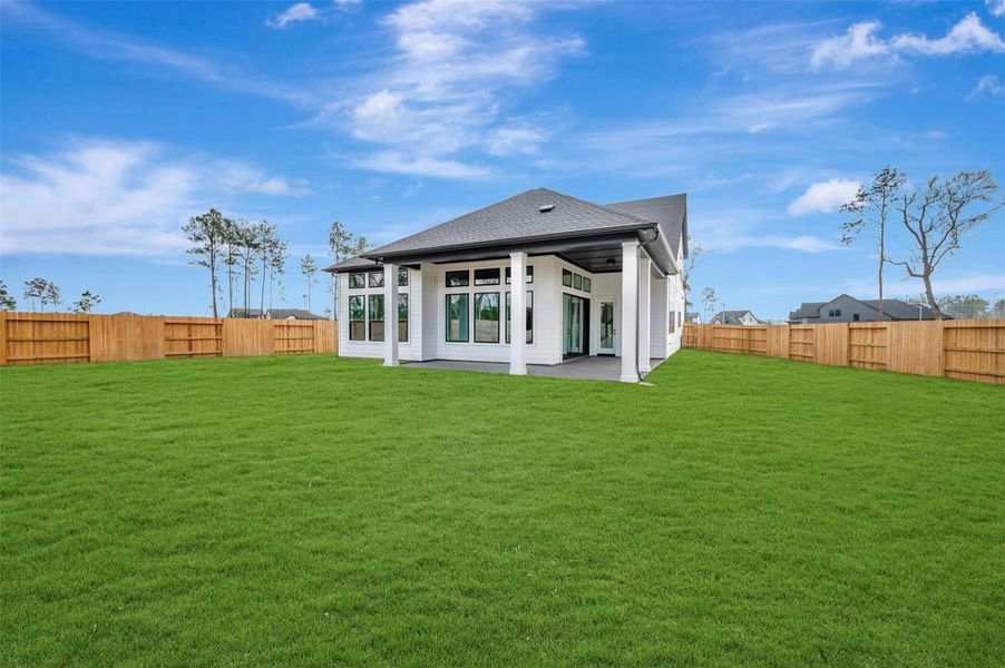 Exterior details and patio area of a home in ARTAVIA 50' Homesites, Conroe (Image 4).