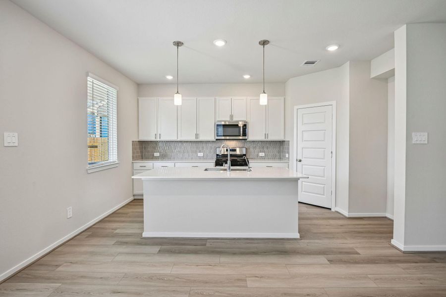 Furnished interior view inside a new home in Pinewood Trails - City Series, Atascocita (Image 5). Furnished interior view inside a new home in Pinewood Trails - City Series, Atascocita (Image 5).