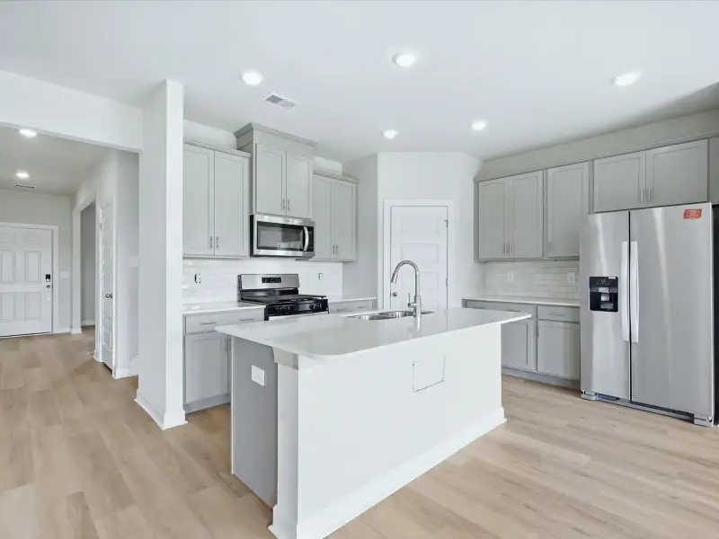 Furnished interior view inside a new home in Brayfield Manor - Signature Collection, Wellford (Image 3).
