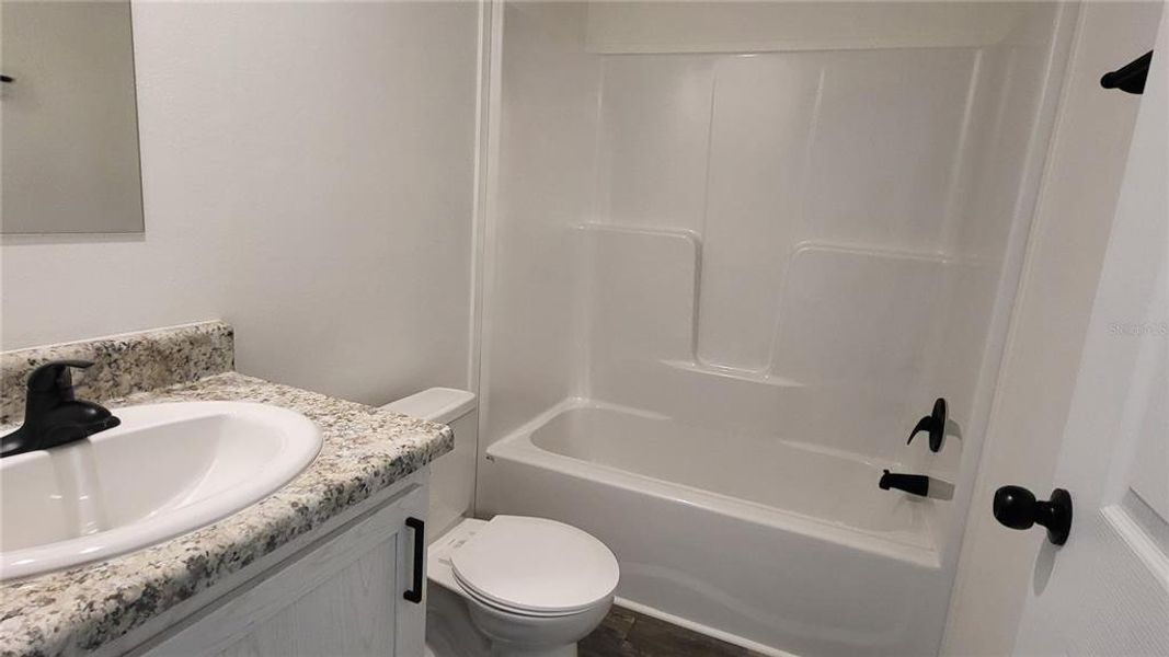 Furnished interior view inside a new home in , Okeechobee (Image 4). Furnished interior view inside a new home in , Okeechobee (Image 4).