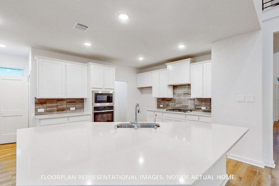 Furnished interior view inside a new home in Marvida, Cypress (Image 12).