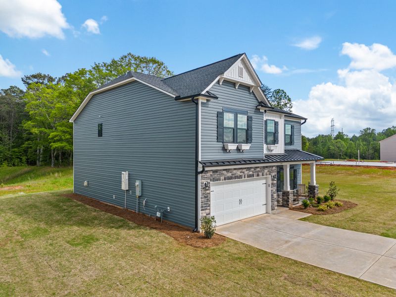 Representative exterior photo of a completed home built from the Brantley II by Great Southern Homes in Collins Cove, Chapin, SC (Image 24).