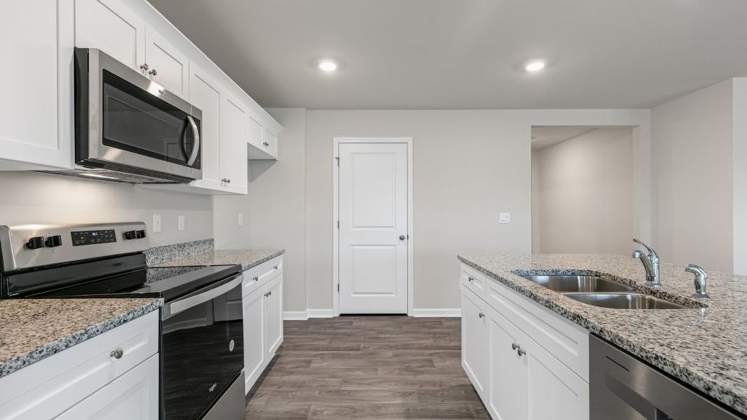 Furnished interior view inside a new home in Bynum Farms, Farmville (Image 6).