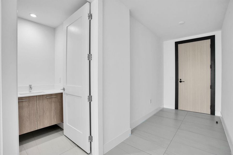 Entrance and Half Bathroom Entrance and Half Bathroom