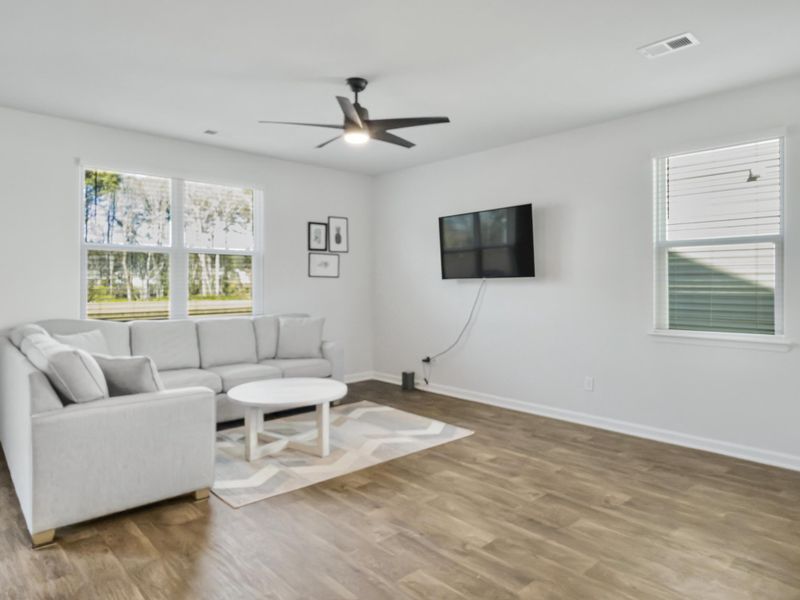 Furnished interior view inside a new home in Pine Hills at Cane Bay, Summerville (Image 5). Furnished interior view inside a new home in Pine Hills at Cane Bay, Summerville (Image 5).
