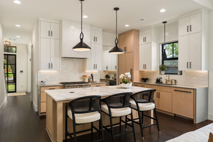 The heart of the home is this beautiful island and chef's kitchen.