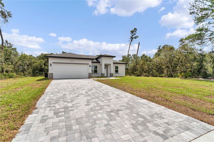 Front exterior of a new home in , Ocala, FL, highlighting curb appeal (Image 20).