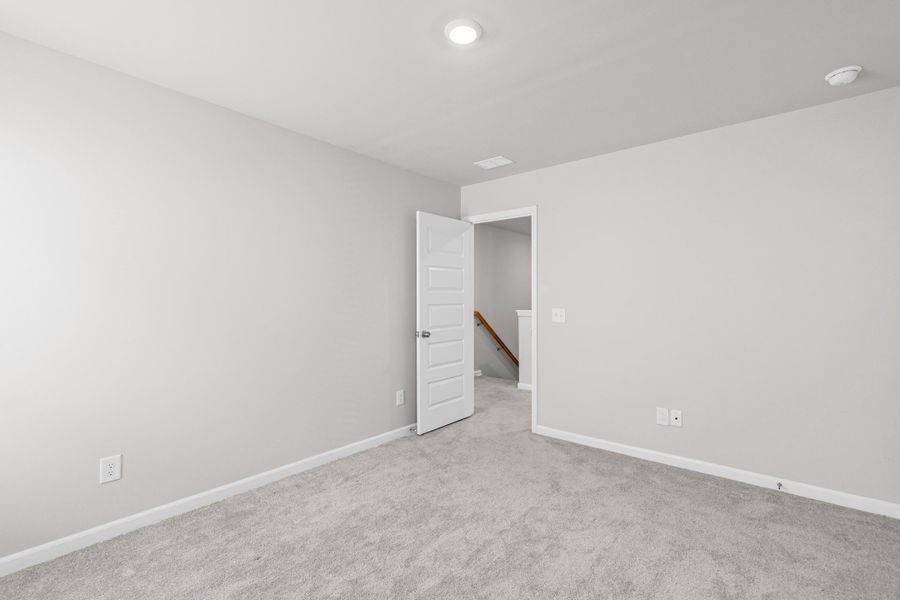 Spacious, unfurnished interior of a new home in Sweetgrass at Summers Corner, Summerville (Image 18).