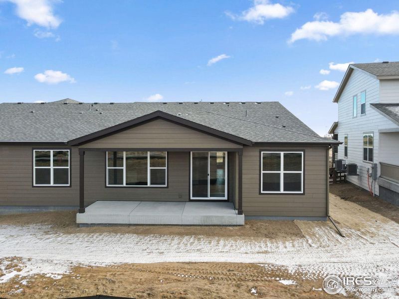 Exterior details and patio area of a home in Cordovan, Longmont (Image 3).