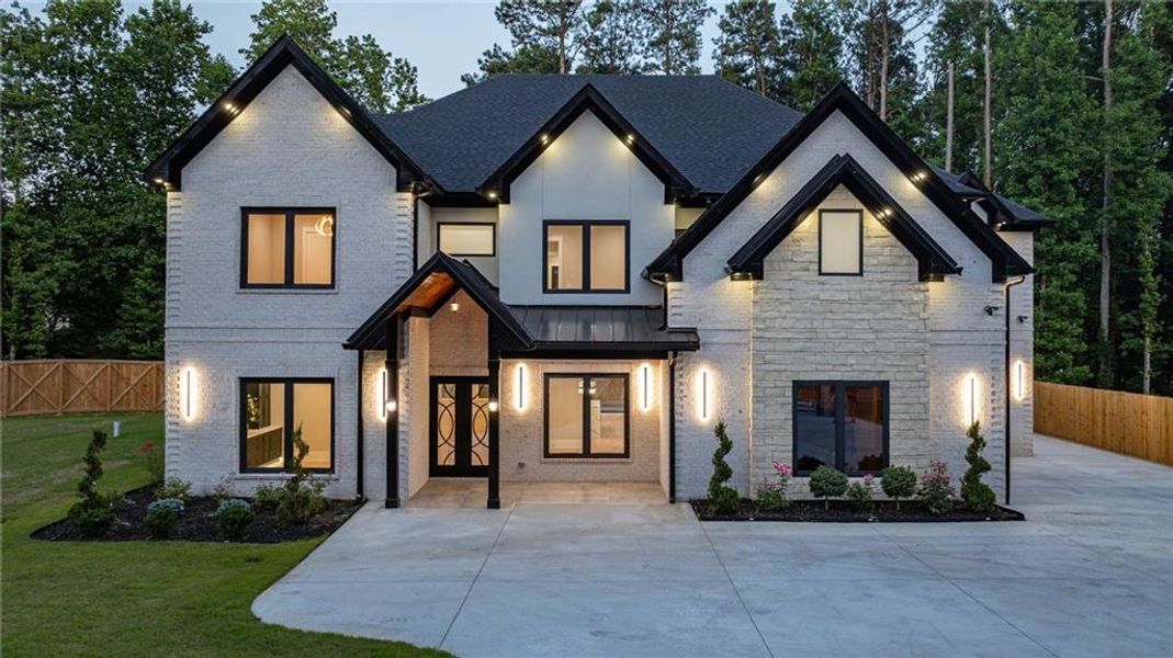 Front exterior of a new home in , Lawrenceville, GA, highlighting curb appeal (Image 32). Front exterior of a new home in , Lawrenceville, GA, highlighting curb appeal (Image 32).
