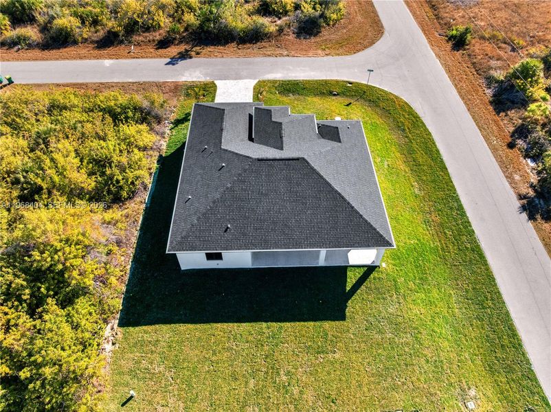 Front exterior of a new home in , Port Charlotte, FL, highlighting curb appeal (Image 24).