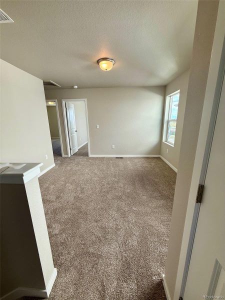 Spacious, unfurnished interior of a new home in Sky Ranch – Uptown Collection, Watkins (Image 13).