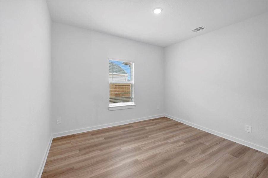 Spacious, unfurnished interior of a new home in Wildrye, Waller (Image 29).
