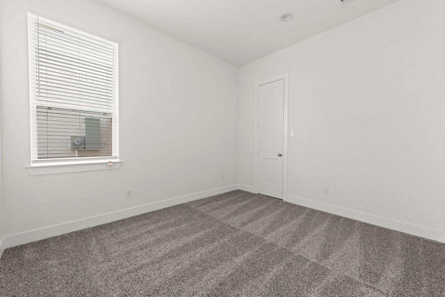 Representative unfurnished interior of a home built from the Rivers 60′ Lot by Chesmar Homes in Fulshear Lakes, Fulshear (Image 26).