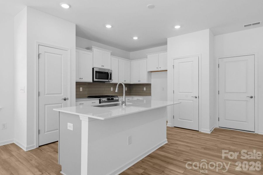 Furnished interior view inside a new home in Cannon Village, York (Image 6).