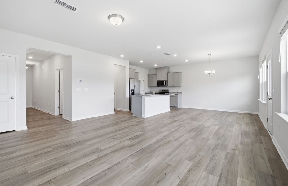 Spacious, unfurnished interior of a new home in Saunders Farm, Willow Spring (Image 21).