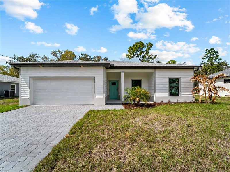 Front exterior of a new home in , North Port, FL, highlighting curb appeal (Image 30).