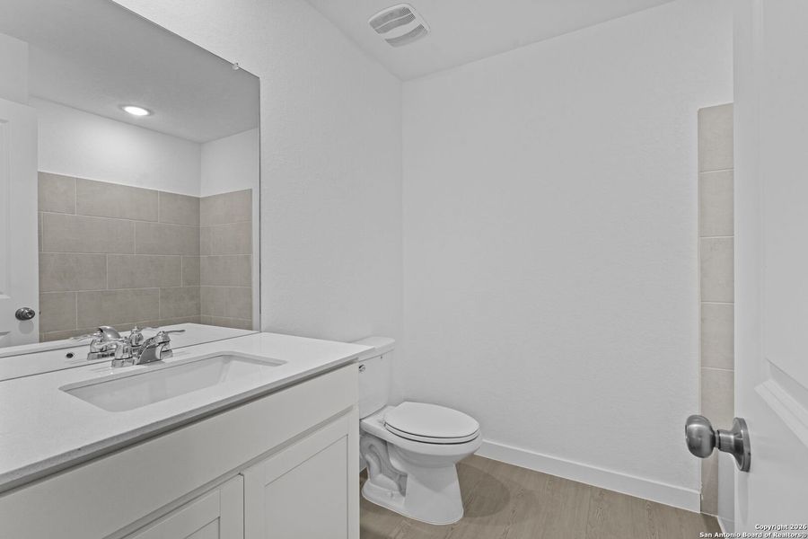 Furnished interior view inside a new home in Voss Farms, New Braunfels (Image 7).