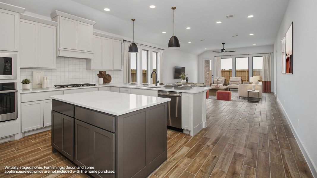 Furnished interior view inside a new home in Lakes of Cane Island, Katy (Image 8).