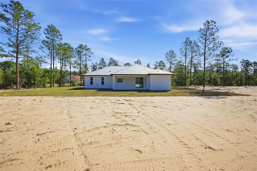 Exterior details and patio area of a home in , Ocala (Image 30).