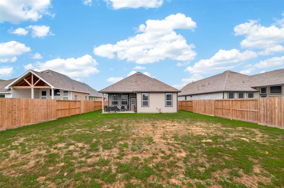 Exterior details and patio area of a home in , Anahuac (Image 23).