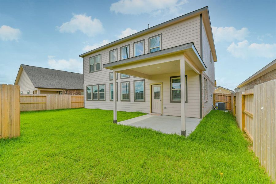 Front exterior of a new home in , Manvel, TX, highlighting curb appeal (Image 25). Front exterior of a new home in , Manvel, TX, highlighting curb appeal (Image 25).