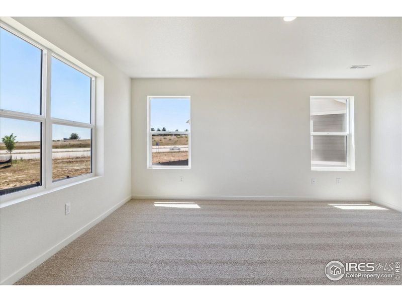 Spacious, unfurnished interior of a new home in Silver Peaks, Lochbuie (Image 23).