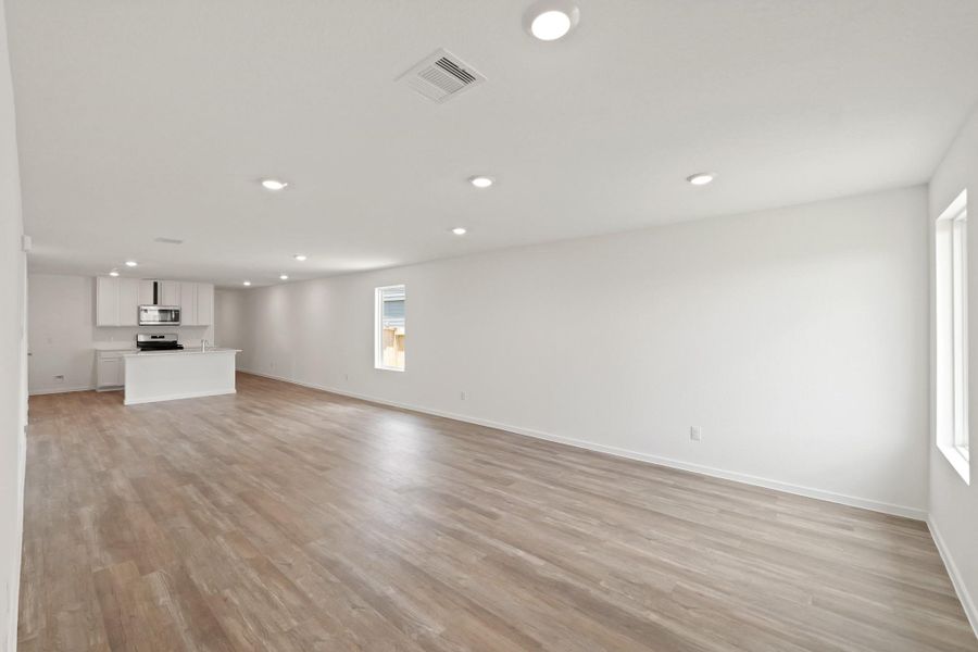 Spacious, unfurnished interior of a new home in The Canopies, Splendora (Image 15).