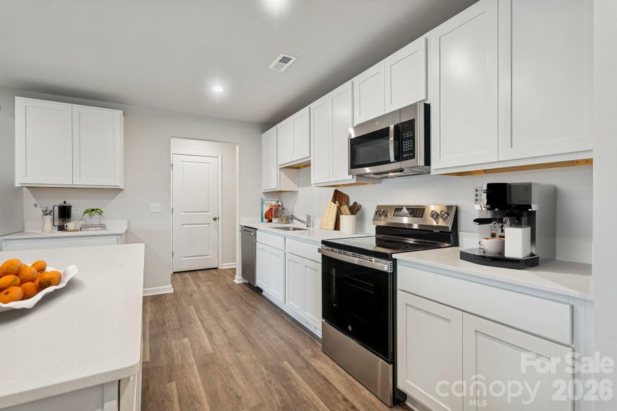 Example Photo Example Photo