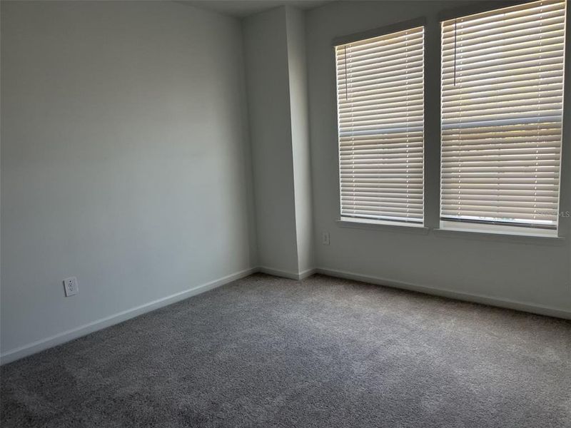 Spacious, unfurnished interior of a new home in Grand Park North, Dunnellon (Image 32).