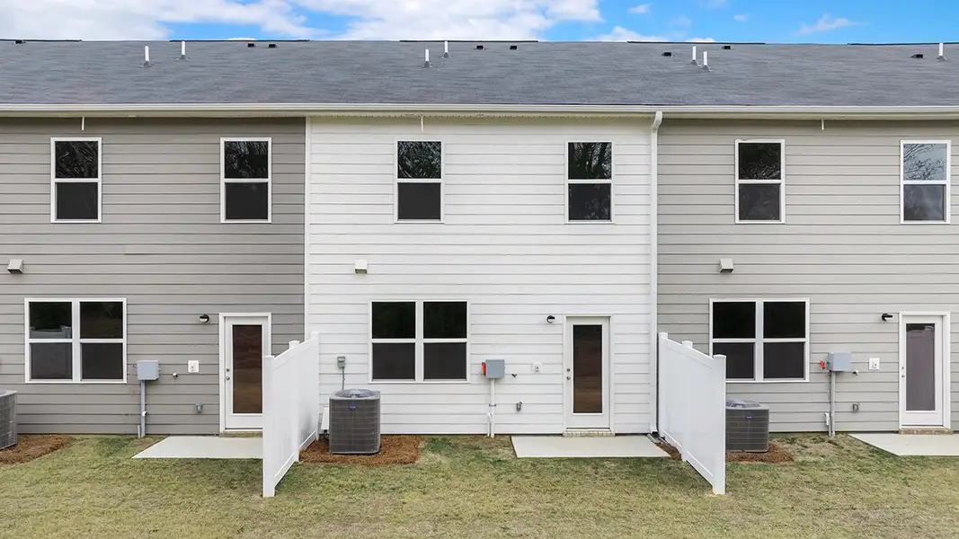 Exterior details and patio area of a home in The Gables at Agricultural Village, Perry (Image 2).