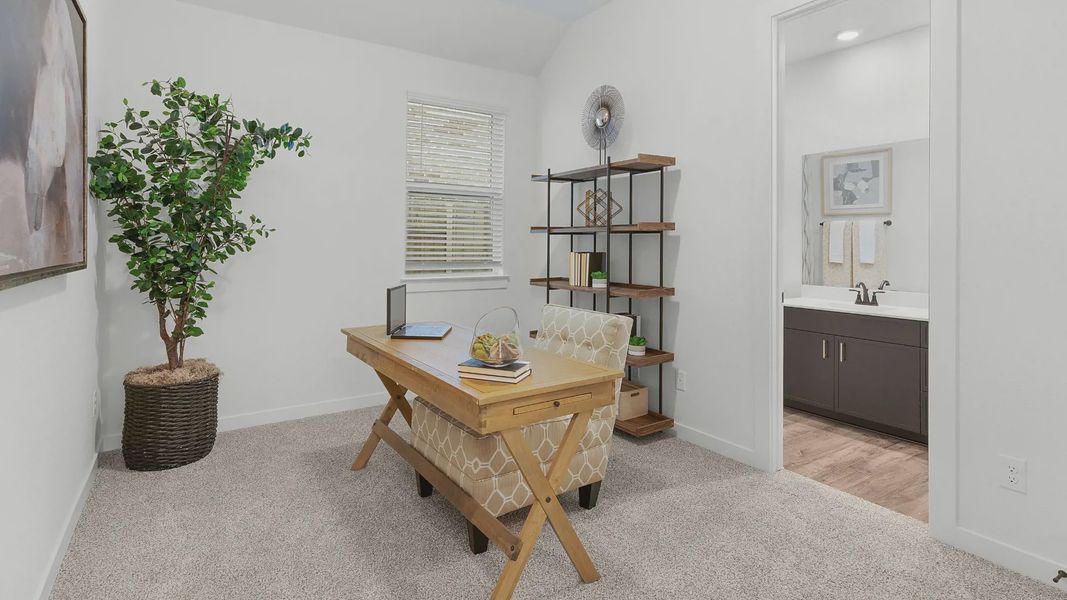 Representative furnished interior of a home built from the Brooks by Chesmar Homes in University Heights, Round Rock (Image 8).