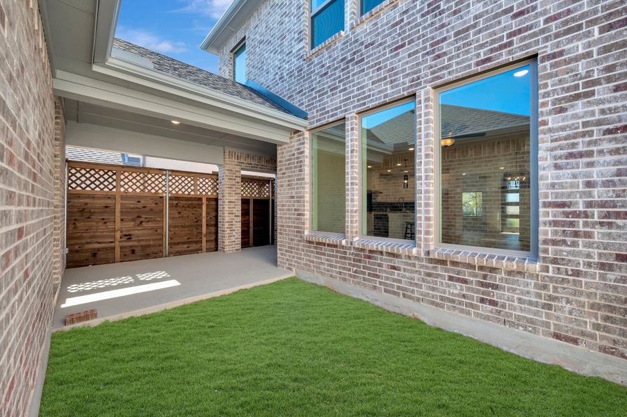 Exterior details and patio area of a home in Solterra - Cottage Series, Mesquite (Image 4).