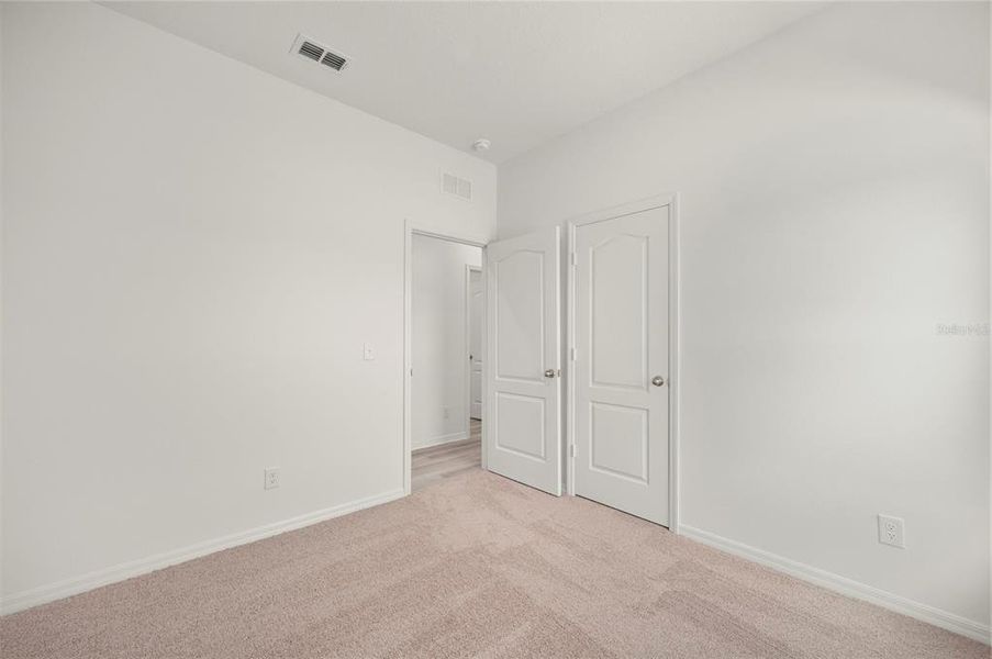 Spacious, unfurnished interior of a new home in Gum Lake Preserve, Lake Alfred (Image 20).