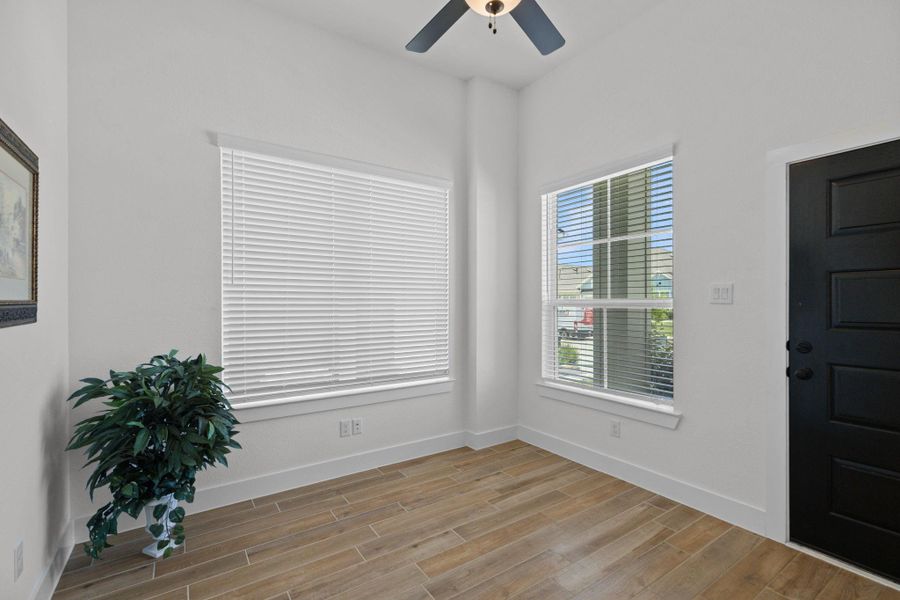 Only home in the neighborhood with a dedicated study or home office and two walls of windows.