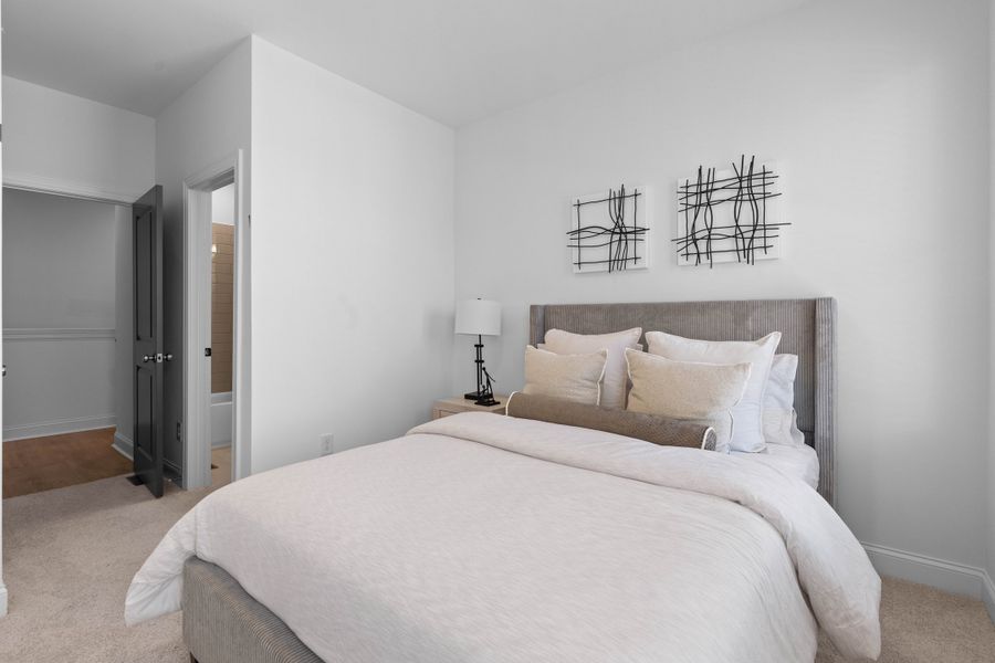 Representative furnished interior of a home built from the The Oleander by The Providence Group in Market Square at Sawnee Village, Cumming (Image 27).