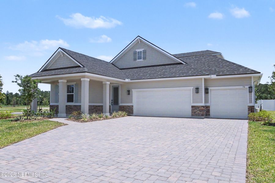 Front exterior of a new home in , St. Augustine, FL, highlighting curb appeal (Image 1). Front exterior of a new home in , St. Augustine, FL, highlighting curb appeal (Image 1).