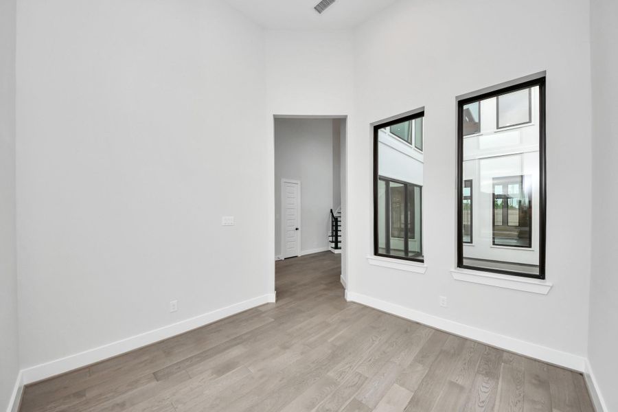 The study sits right beside the front door and overlooks the courtyard.