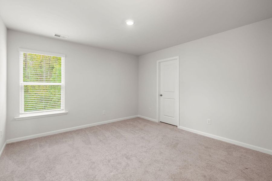Spacious, unfurnished interior of a new home in The Ponds, Summerville (Image 32).