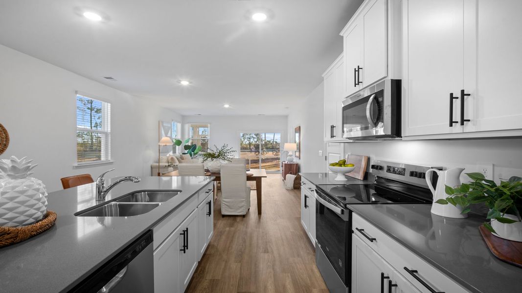 Furnished interior view inside a new home in The Lakes at North Glynn, Brunswick (Image 6).